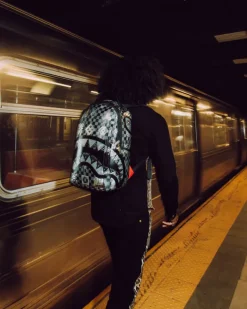 AFRICAN INTELLIGENCE 9 POWER GLYPHICS BACKPACK - SANDFLOWER COLLAB